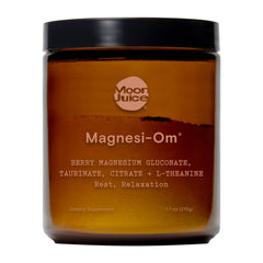 Moon Juice Magnesi-Om berry powder bottle ready for your nightly calm routine