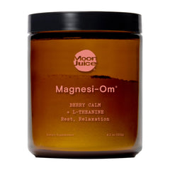 Moon Juice Magnesi-Om powder bottle showing the chelated magnesium blend for calm evenings.