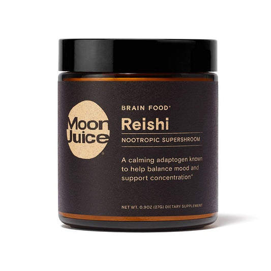 Moon Juice Reishi bottle pouring for daily adaptogen ritual