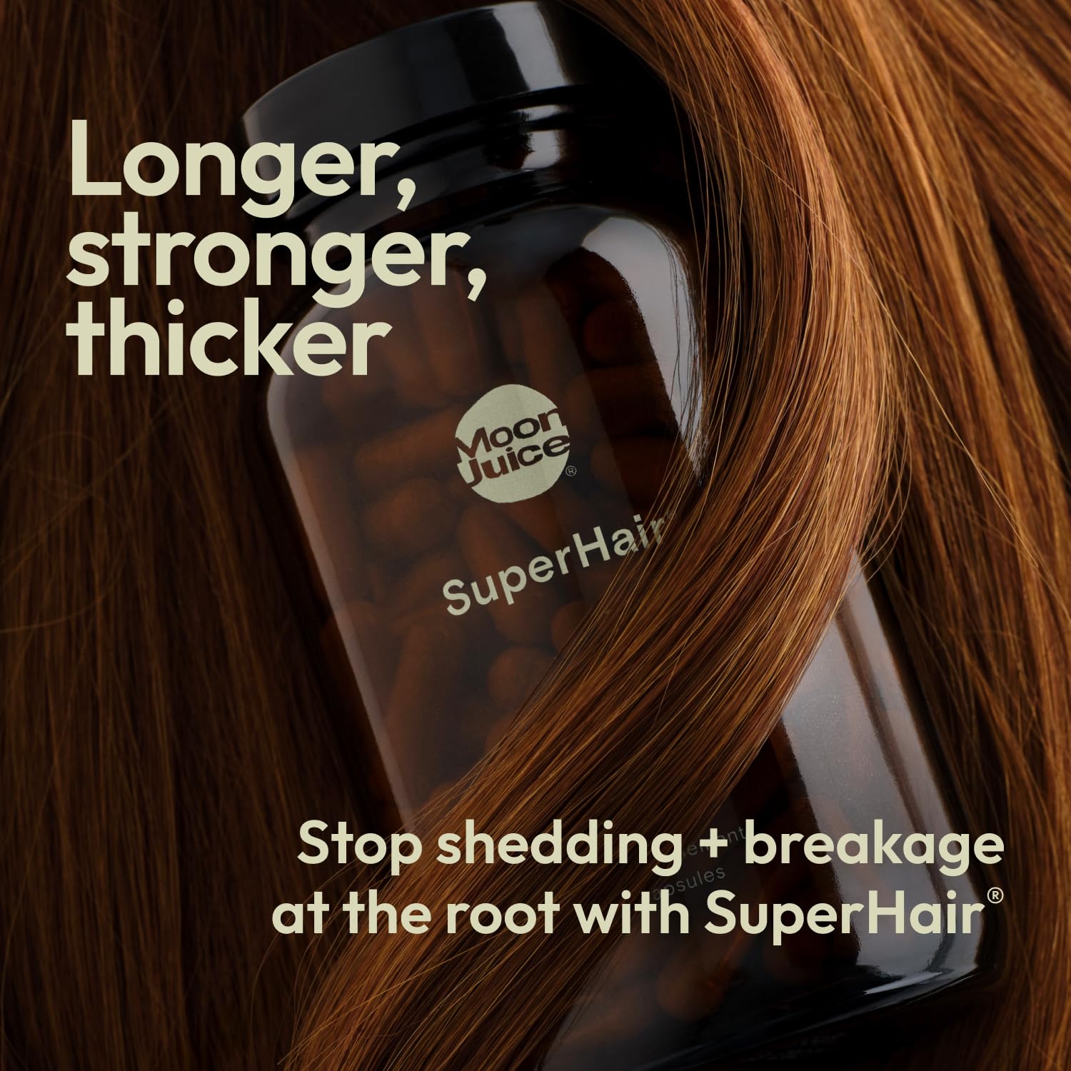 Moon Juice SuperHair capsules closeup highlights ingredients for hair resilience.