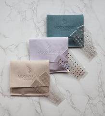 Moon Rabbit rose-gold tweezers support precise application and tidy storage.