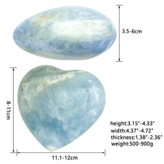 Moonsix blue Celestite heart polished surface shows natural color variation for meditation.