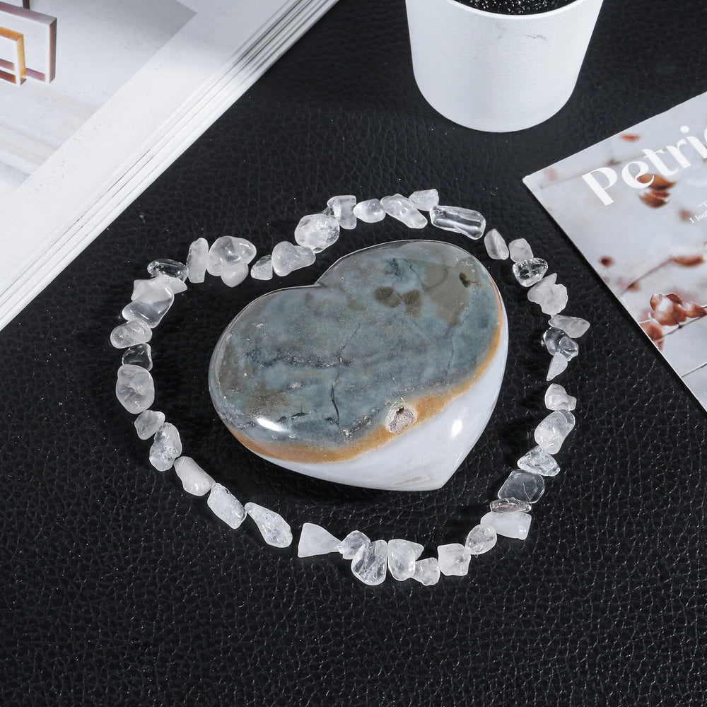 moonsix Heart-shaped Crystal Carved from ocean agate with unique color variations.