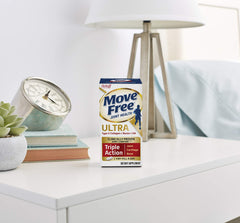 Move Free bottle in hand illustrating portable daily joint care.