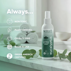 Mist being dispensed from MOXE spray as you shower