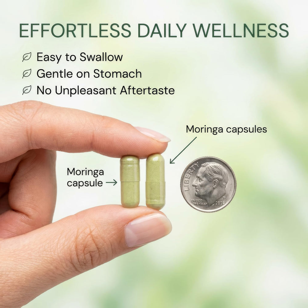 MPRAYAN Moringa capsules beside a glass of water.