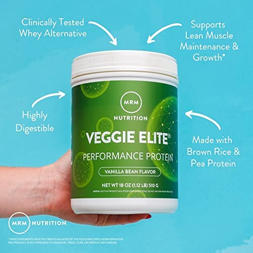MRM Veggie Elite Protein scoop dispensing into powder for a ready-to-make serving.