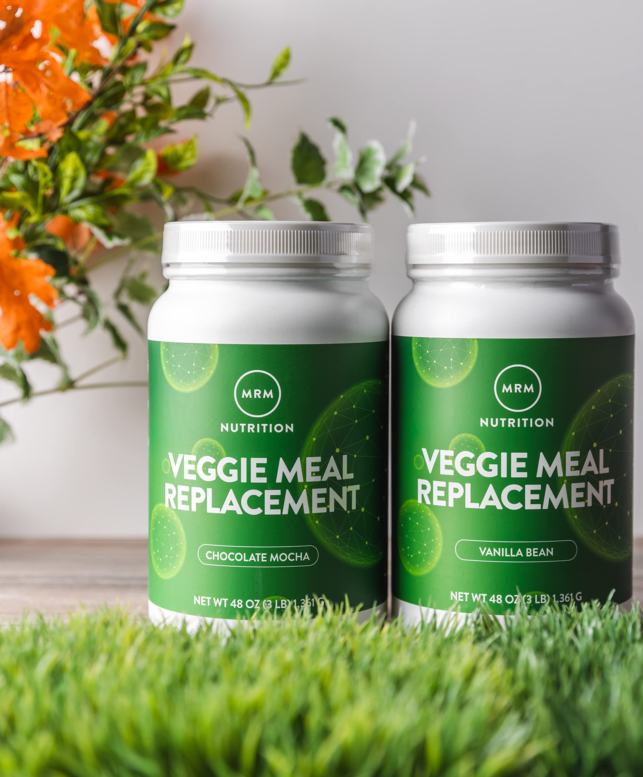 On-the-go mixer bottle with veggie meal powder ready to blend