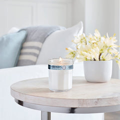 Mrs. Meyer's Snow Drop Candle scent notes: orange, mandarin, white grapefruit.