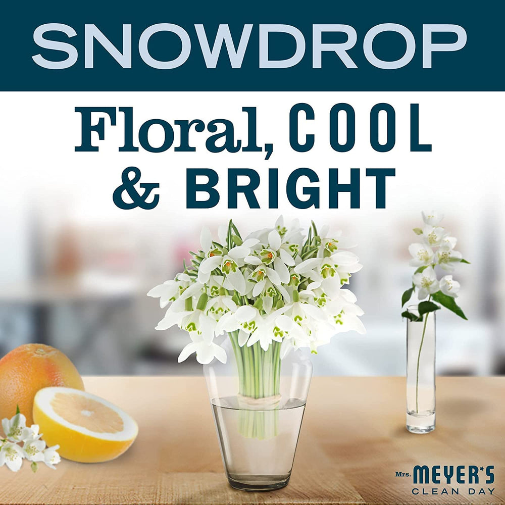 Snow Drop Candle on a frosted winter tablescape for cozy ambiance.