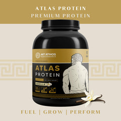 Scoop dispensing Atlas Vanilla powder for easy shake preparation.