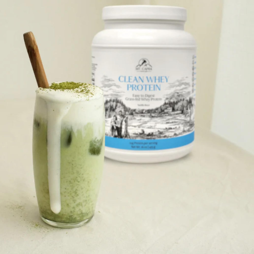 Pouring Mt. Capra Goat Whey into a breakfast shake