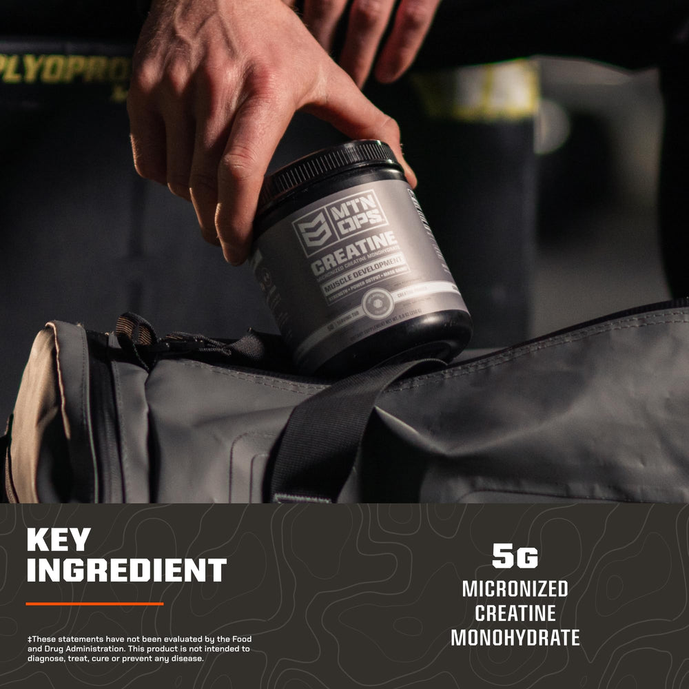 MTN OPS creatine powder serving spoon highlighting precise dosing for workouts.
