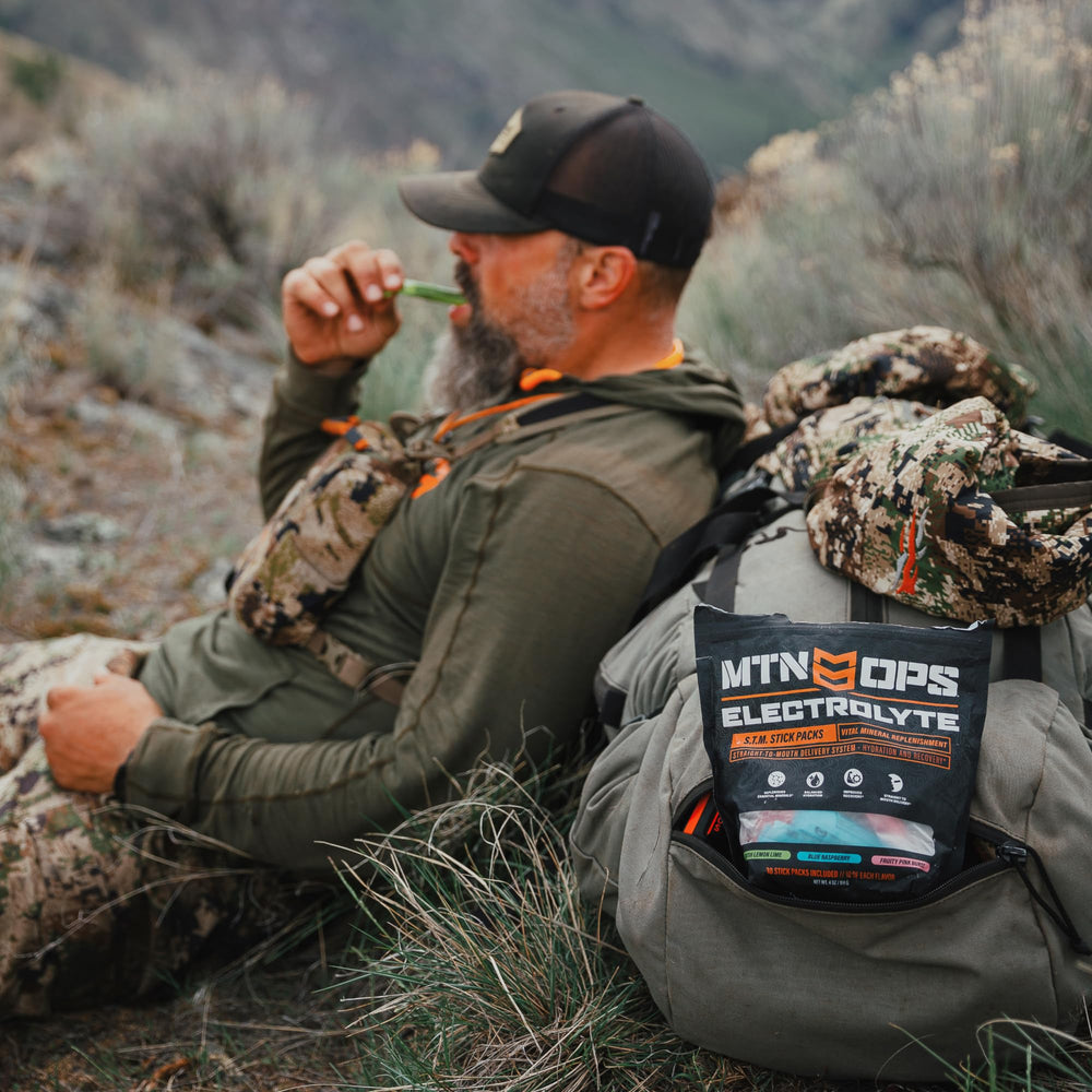 MTN OPS electrolytes packets in hand ready for workout use