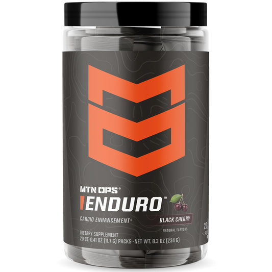MTN OPS Enduro Trail Packs black cherry powder dissolving in water for non-stim energy support