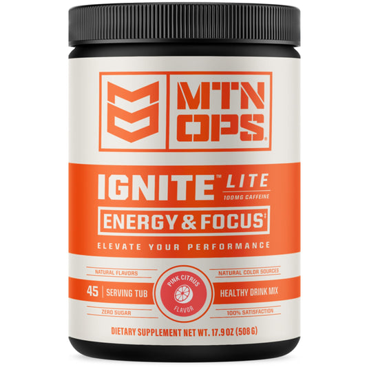MTN OPS Ignite Lite pink citrus bottle ready for a workout energy boost
