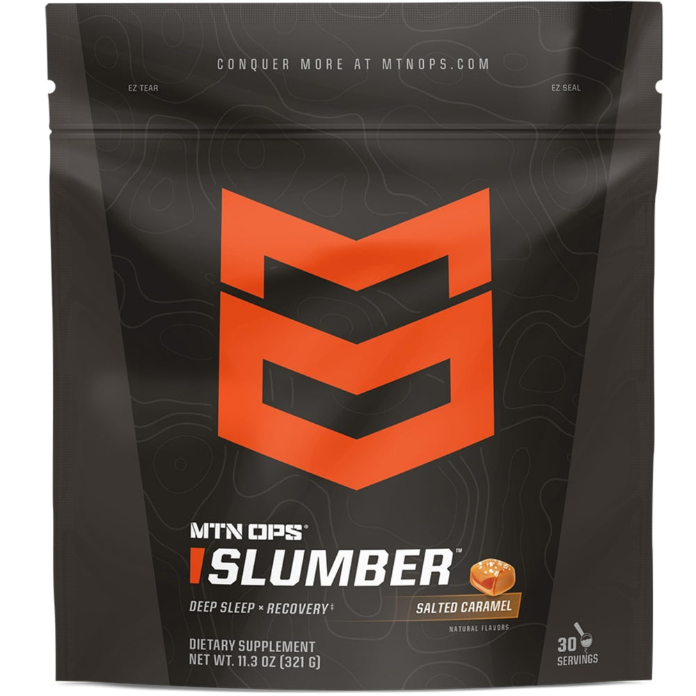 MTN OPS Slumber canister on a nightstand with a warm mug for deep sleep support