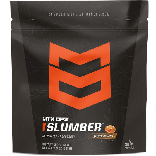MTN OPS Slumber canister on a nightstand with a warm mug for deep sleep support