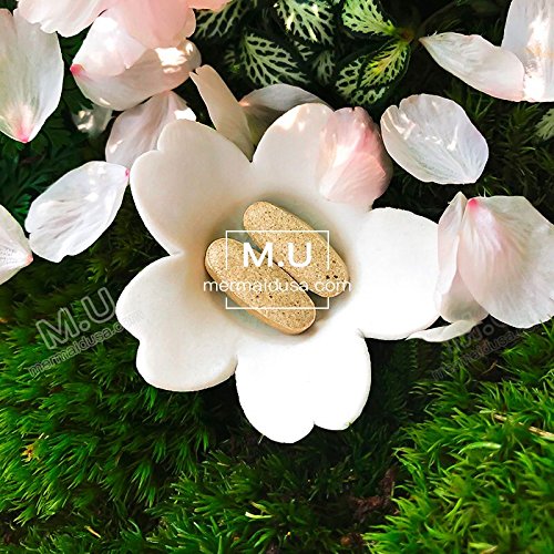M.U Magic Whitening Pills pack shown for a consistent brightening routine.