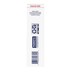 Mucinex DM 12hr tablets on hand highlighting ease of use during busy days.