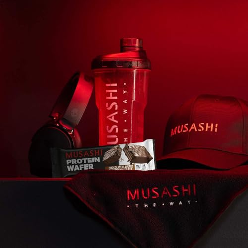 Athlete in training enjoying a Musashi bar during a session.