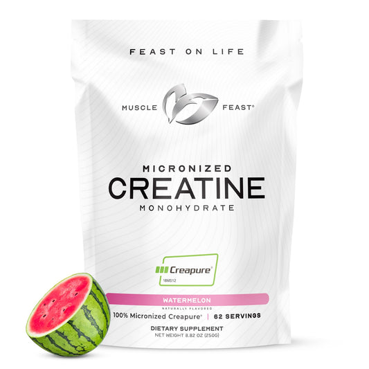 Muscle Feast Creapure Watermelon tub front showing premium creatine quality for workouts.