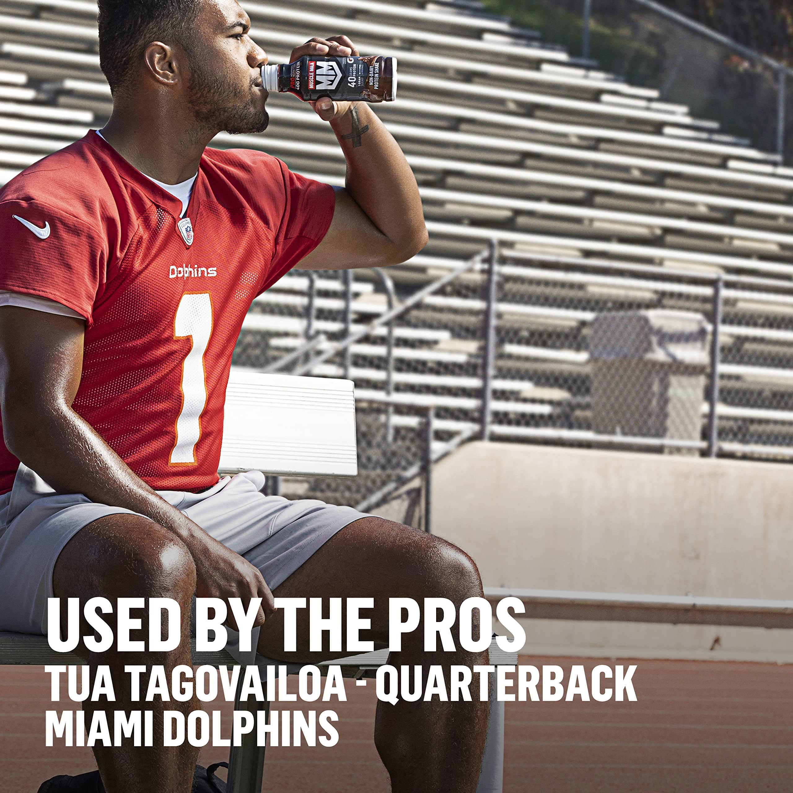 Tall glass filled with Muscle Milk Pro shake in intense vanilla