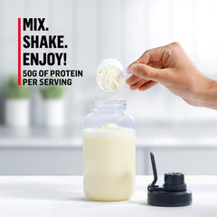 Pouring Muscle Milk Pro Series Intense Vanilla into a shaker for on-the-go protein