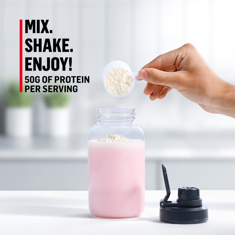 Prepared Muscle Milk shake in glass ready as a snack.