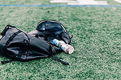 Muscle Milk Zero Vanilla protein shake being poured, convenient post-workout fuel.