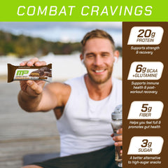 MusclePharm Combat Sport Bar texture close-up shows chewy and crispy bite for satisfying snack