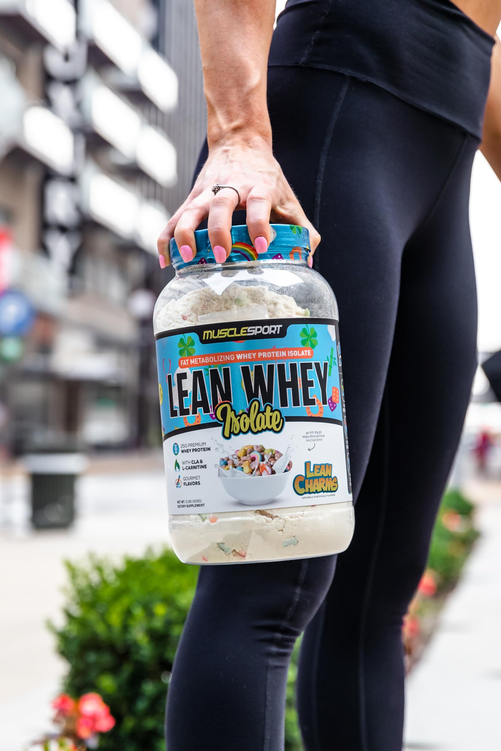 MuscleSport Lean Whey Revolution foam top indicates creamy texture for shakes.