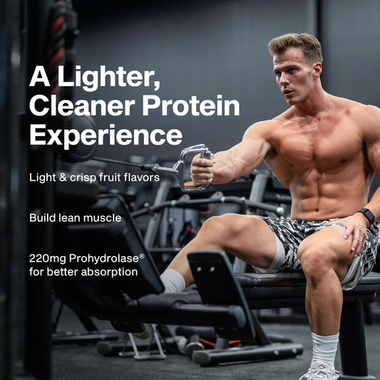 Muscletech Clear Whey Lemon Berry Blizzard glass with translucent protein drink.