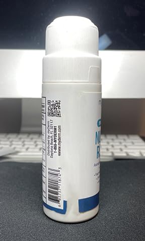 Label close-up highlighting 5% lidocaine and soothing botanical extracts.