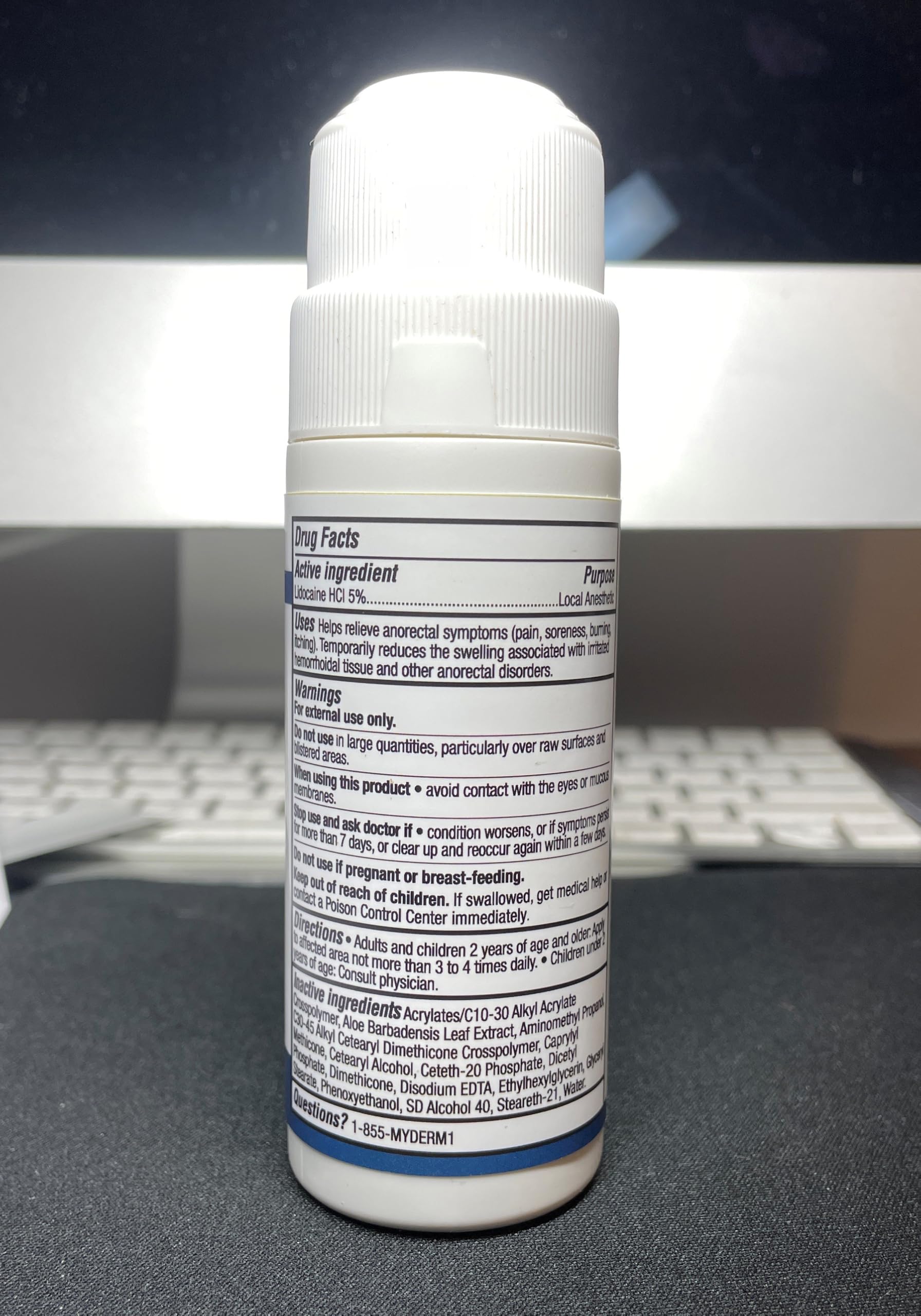 Roll-on applied to skin showing touch-free usage.