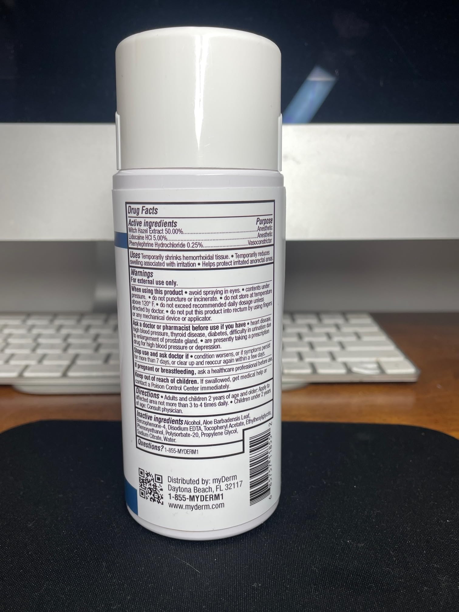 Myderm Three Pack Numbing Spray in use for quick self-application.