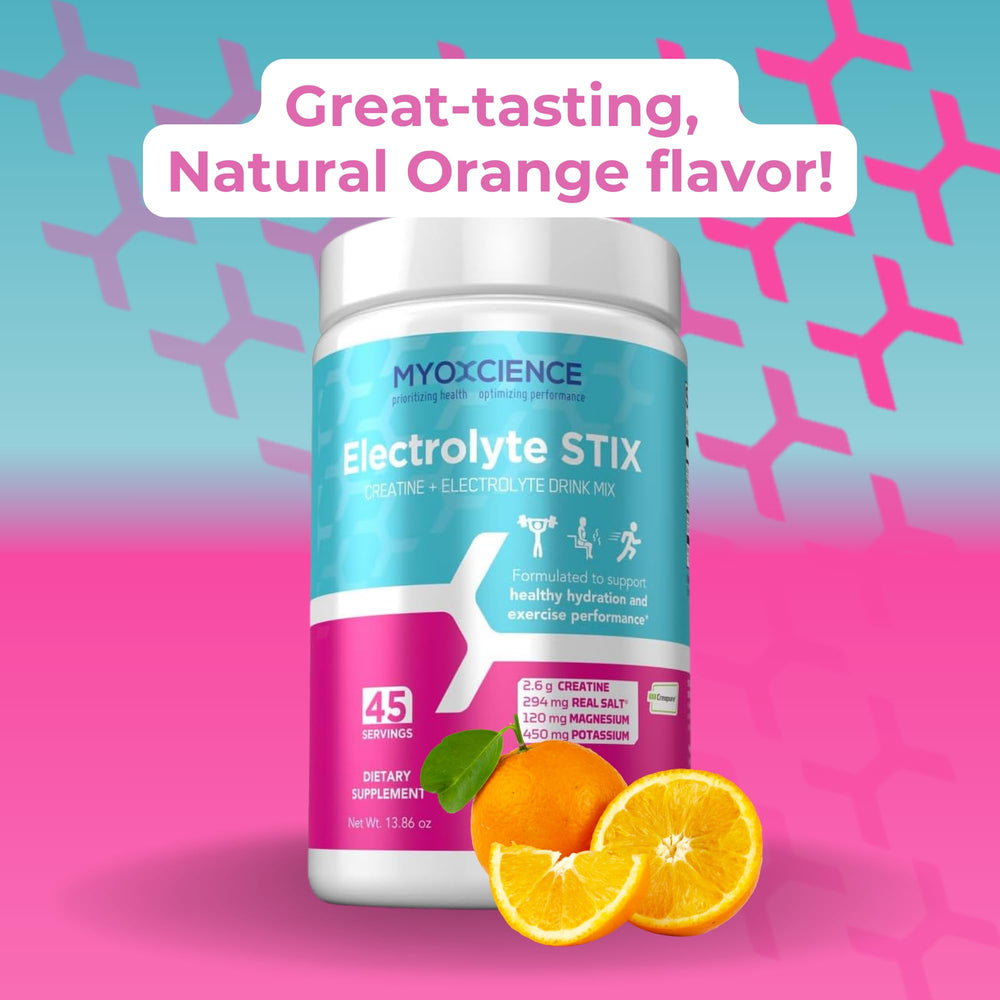 Glass with orange electrolyte drink dissolving MYOXCIENCE Electrolyte STIX