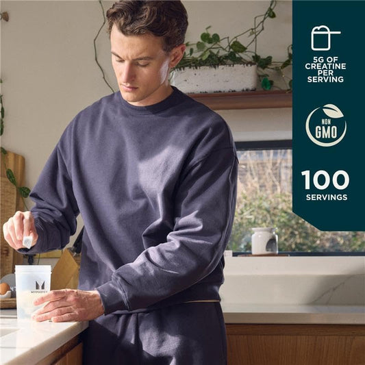 Scoop of Myprotein Creatine Monohydrate powder for pre workout use