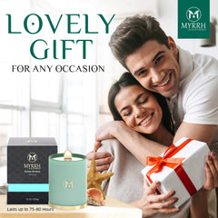 Myrrh Bliss Ocean Breeze candle display in bathroom setting.