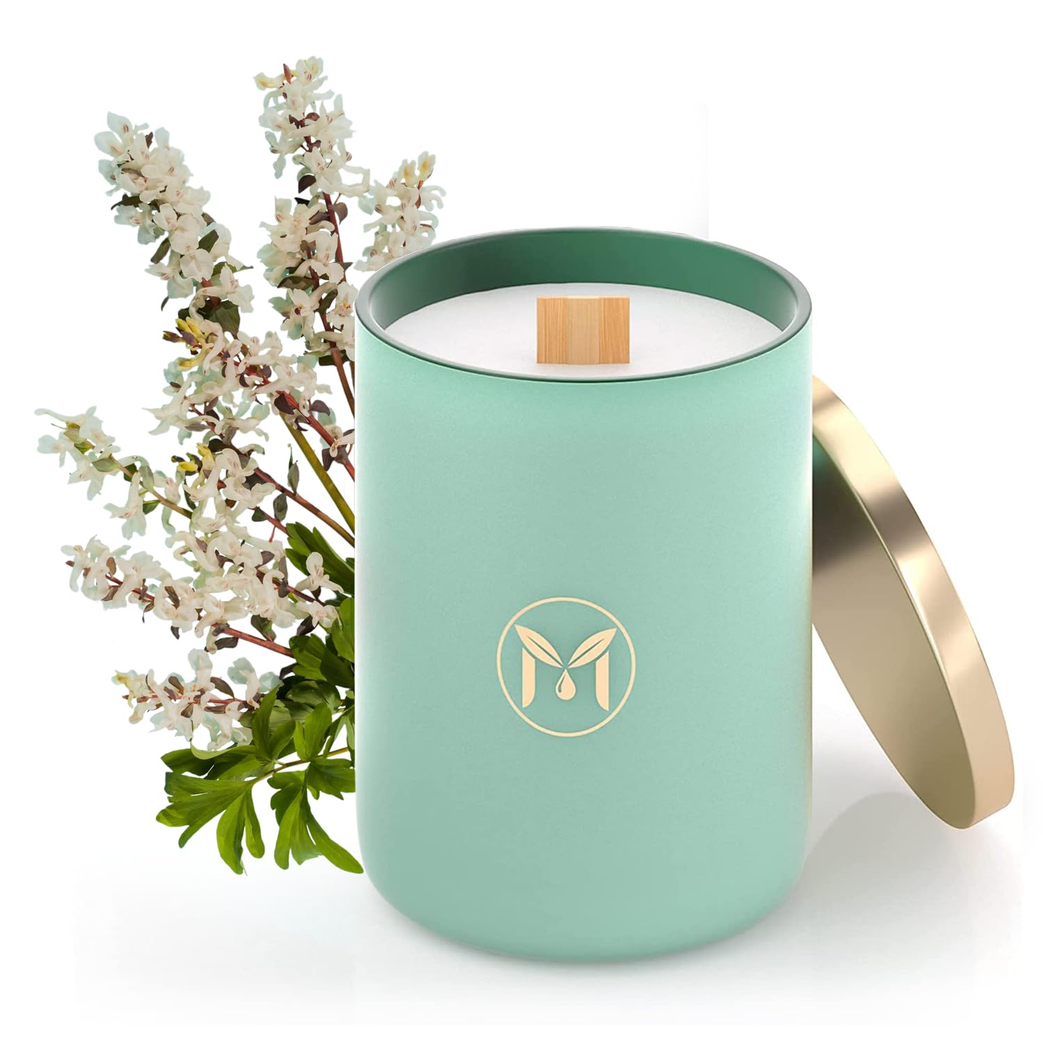 Myrrh Bliss of Essence Ocean Breeze candle in glass jar for relaxing living room ambiance.