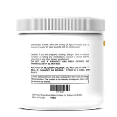 Bottle of Nagano Trim Lean Body Ultra Burn on a kitchen counter beside citrus juice.