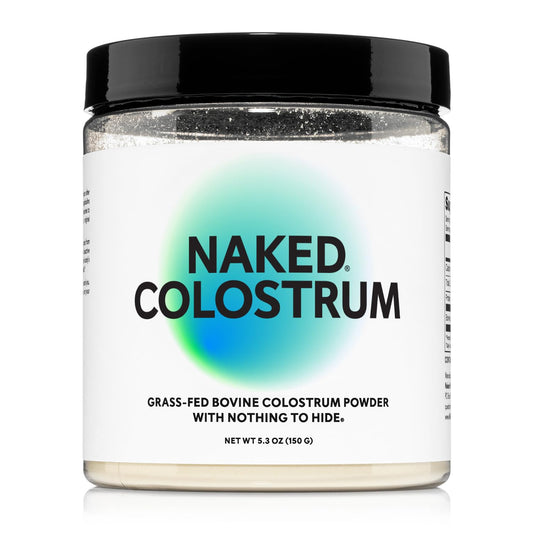 NAKED Colostrum Powder canister showing 100 percent grass-fed formula for gut health support.