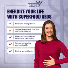 Nation Health MD Reds Powder smoothie prep in a glass with red berry hue