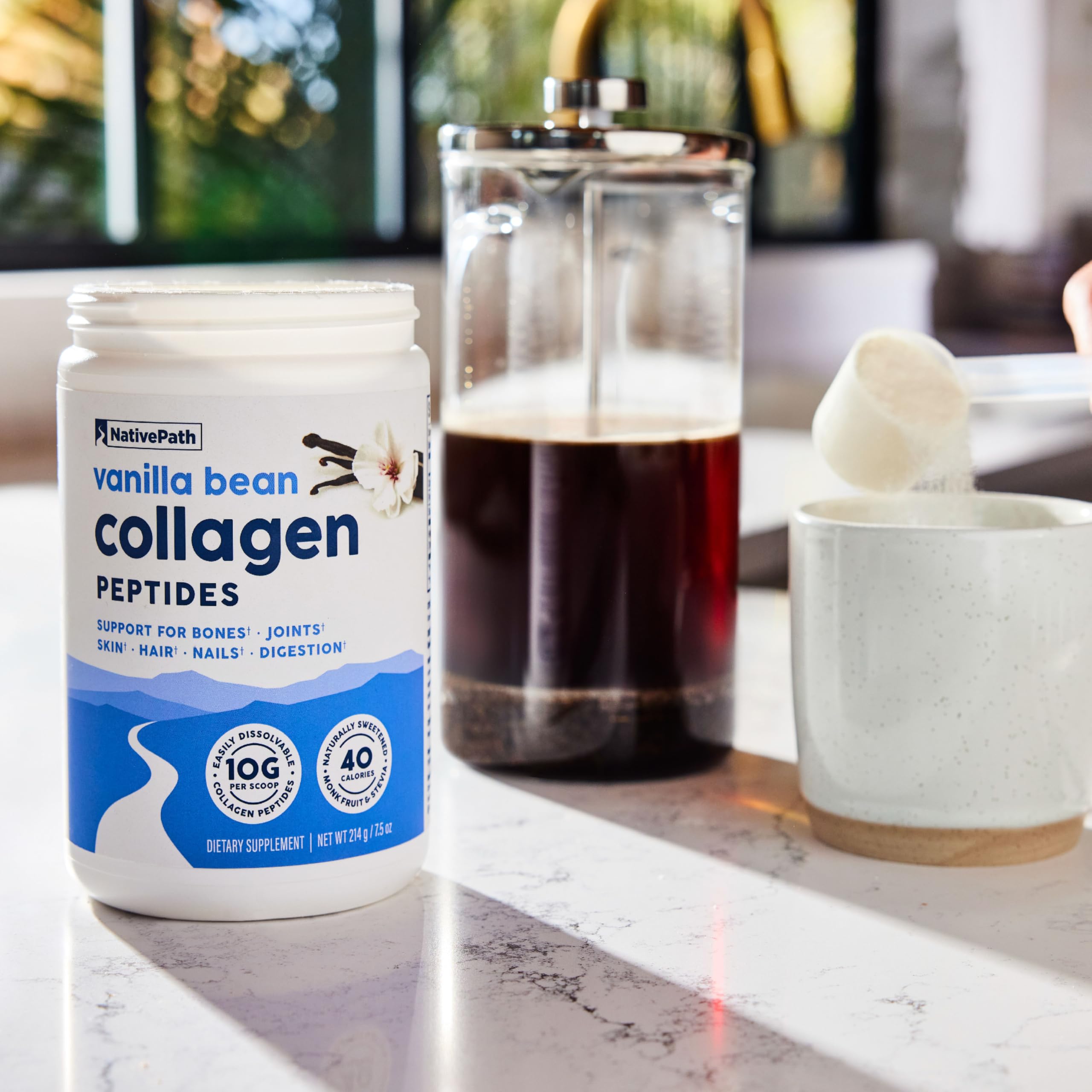 NativePath Collagen Peptides vanilla-bean jar beside glass of smoothie