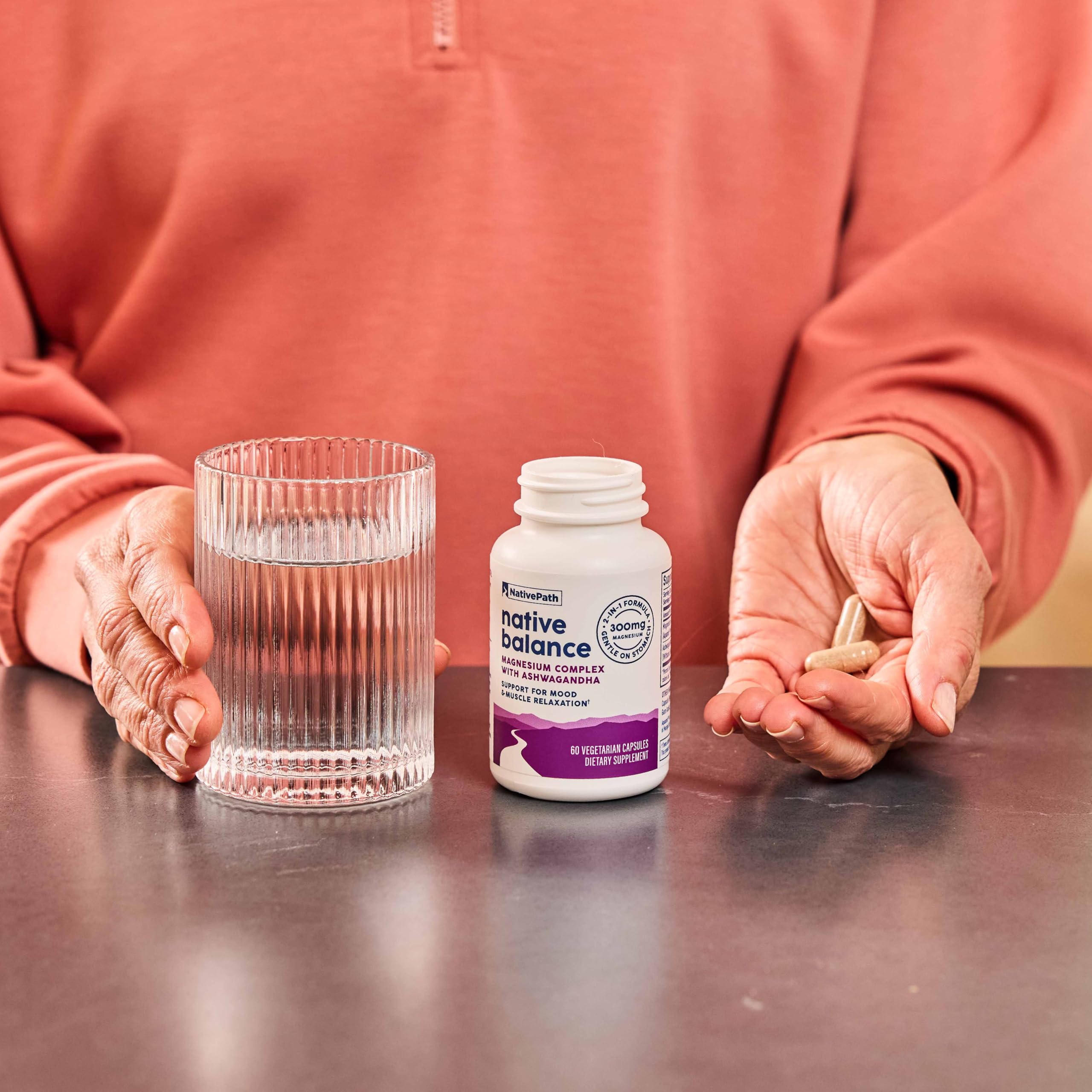 NativePath Native Balance capsules in hand for easy daily supplementation.