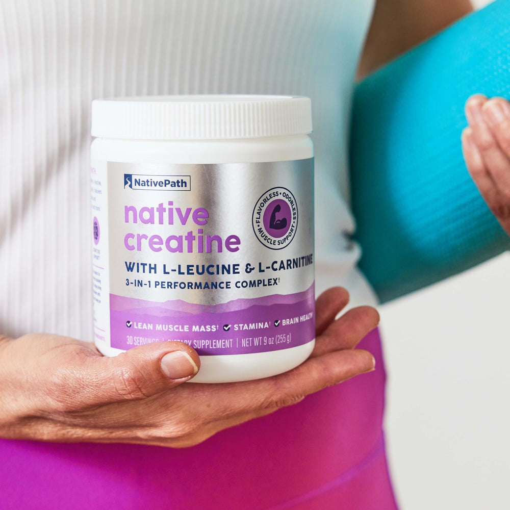 Scoop with nutrition facts: 5g creatine, 2g leucine, 1.5g carnitine per serving