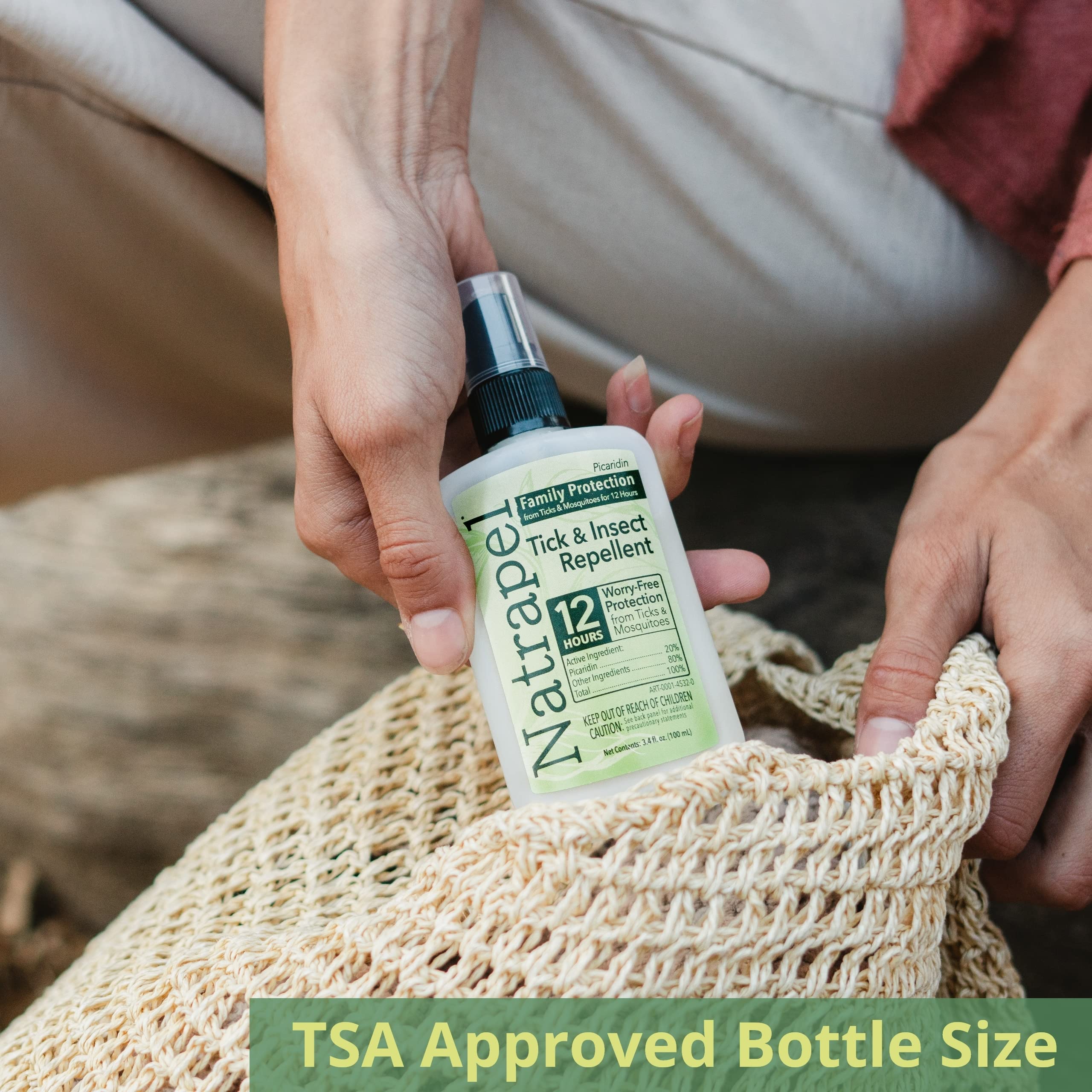 Kid-friendly Natrapel spray demonstrated for family outdoor use