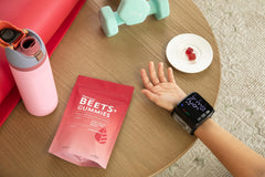Natrava Beets+ Gummies on a desk setup reflecting a modern wellness routine