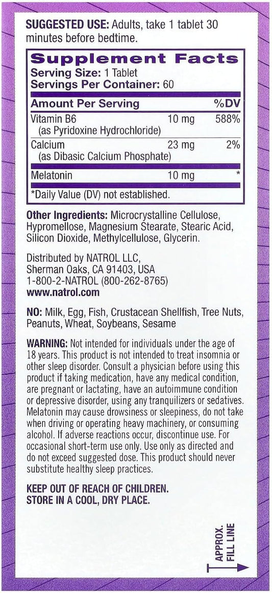 Close-up of Natrol melatonin tablets showing easy-to-swallow 10 mg dosage for nightly use.
