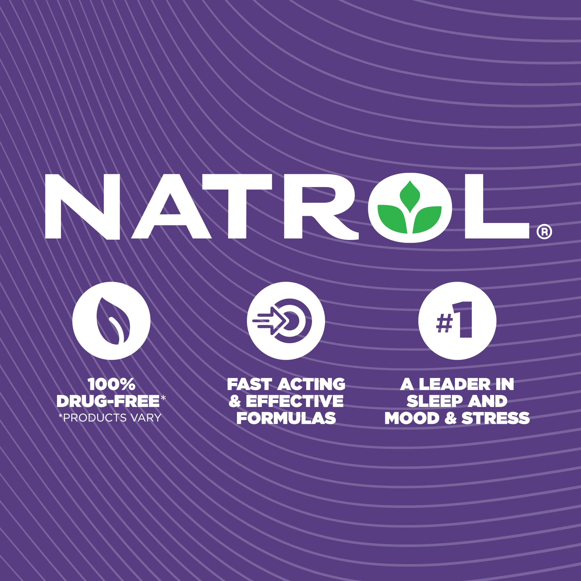 Natrol CoQ-10 softgels stacked beside a glass of water.
